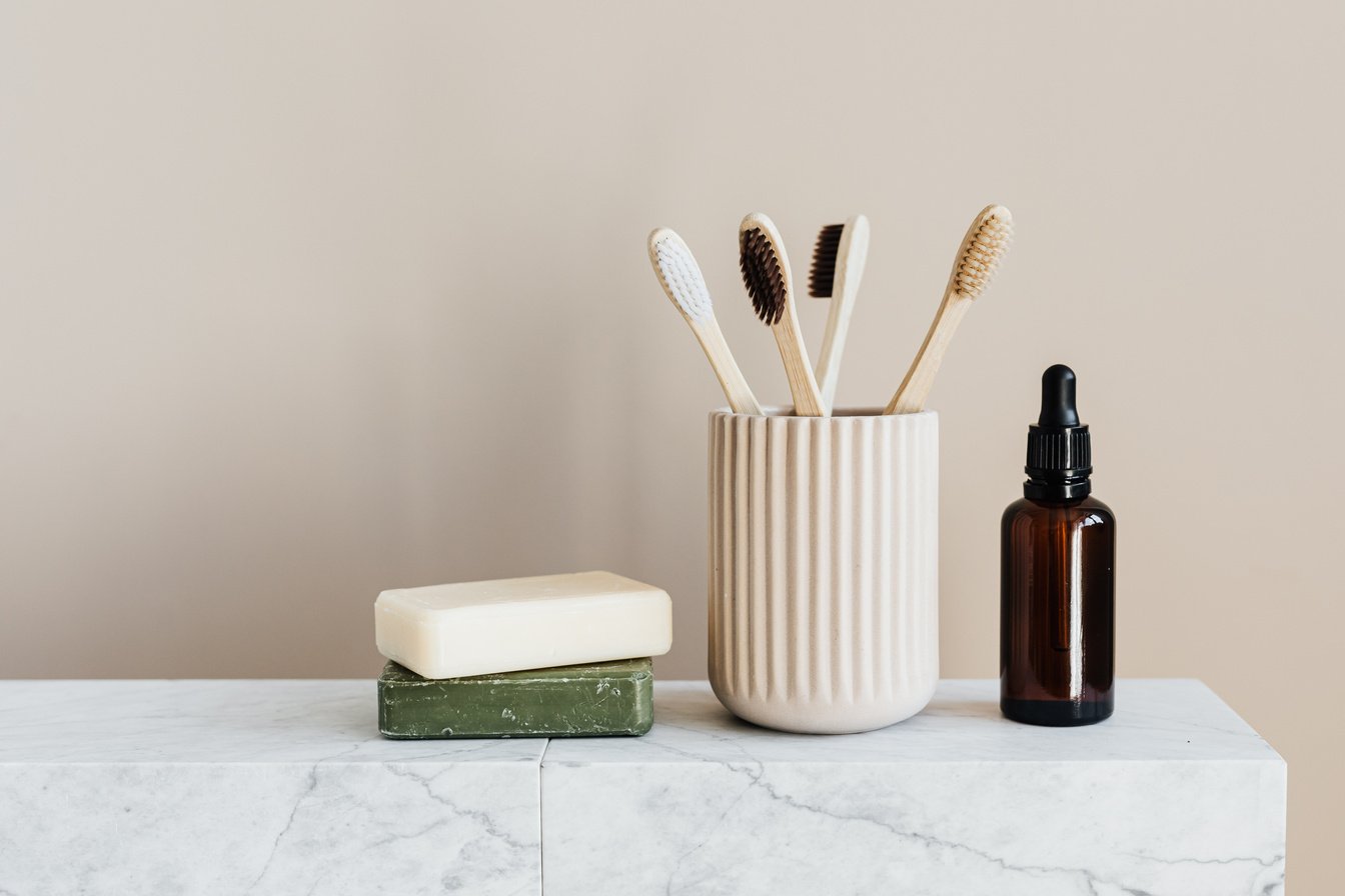 Set of natural nonpolluting toiletries on marble table